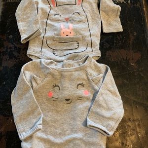 bundle of three Carter's onesies.